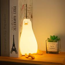 Flat Duck Nightlight. Soft squiggy silicone, touch activated, 30 minute timer, rechargable, book holder, phone holder. Great for kids, teenagers and adults.
