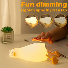 Flat Duck Nightlight. Soft squiggy silicone, touch activated, 30 minute timer, rechargable, book holder, phone holder. Great for kids, teenagers and adults.