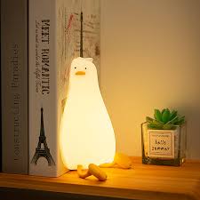 Flat Duck Nightlight. Soft squiggy silicone, touch activated, 30 minute timer, rechargable, book holder, phone holder. Great for kids, teenagers and adults. 