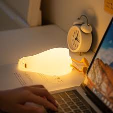 Flat Duck Nightlight. Soft squiggy silicone, touch activated, 30 minute timer, rechargable, book holder, phone holder. Great for kids, teenagers and adults. 