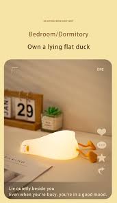 Flat Duck Nightlight. Soft squiggy silicone, touch activated, 30 minute timer, rechargable, book holder, phone holder. Great for kids, teenagers and adults. 