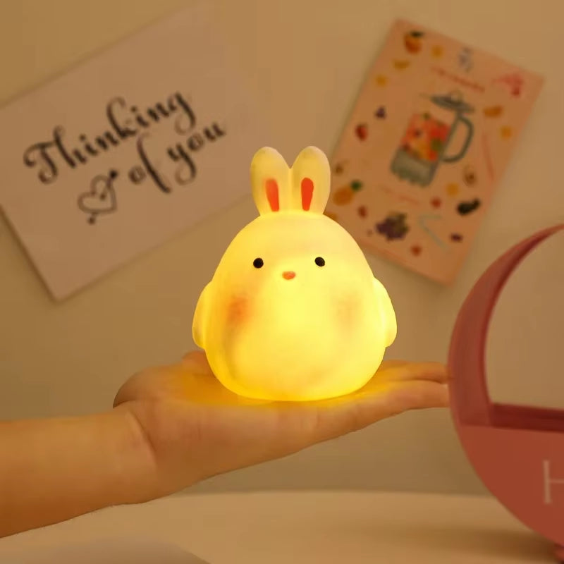 Flat Duck Nightlight. Soft squiggy silicone, touch activated, 30 minute timer, rechargable, book holder, phone holder. Great for kids, teenagers and adults. 